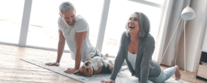 Couple yoga living room