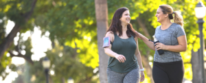 Women walking in park together