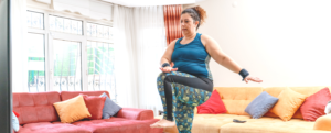 Woman dancing in living room