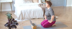 woman doing pilates on floor